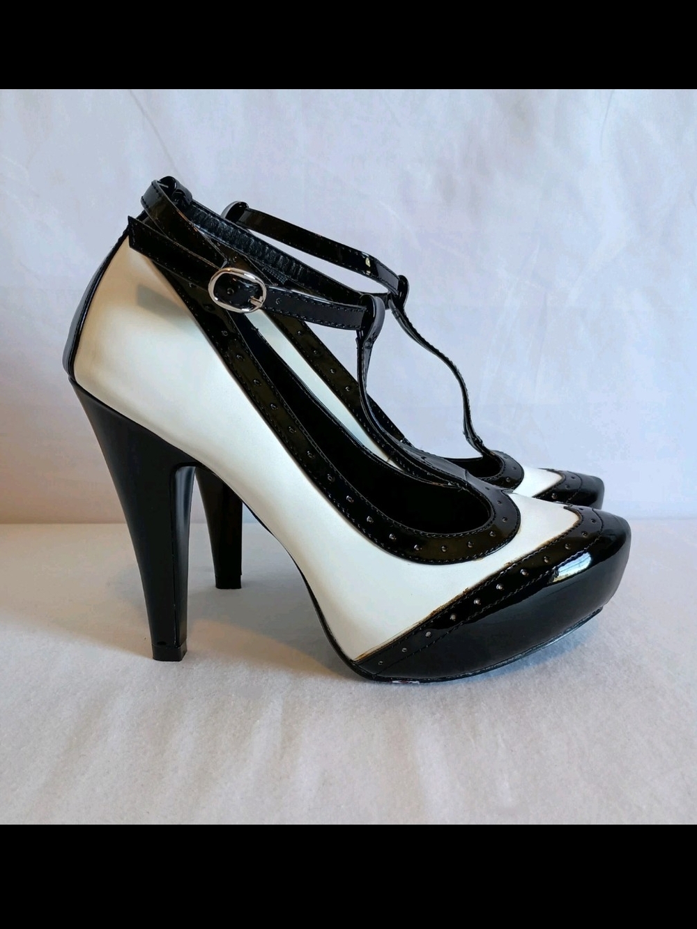 Pinup Couture Black and White T‑strap Wingtip High Heels Deadly Dames Style